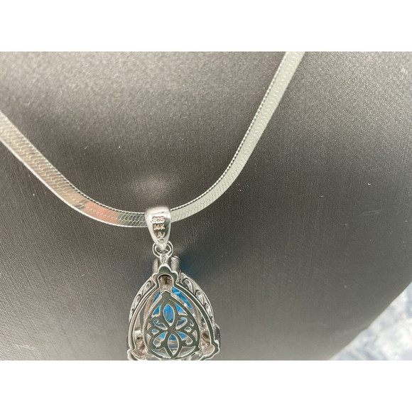 925/14k Blue Topaz 16mm x 10mm w/ Diamond Chips Pendant w/ 24” Chain - Picture 3 of 5